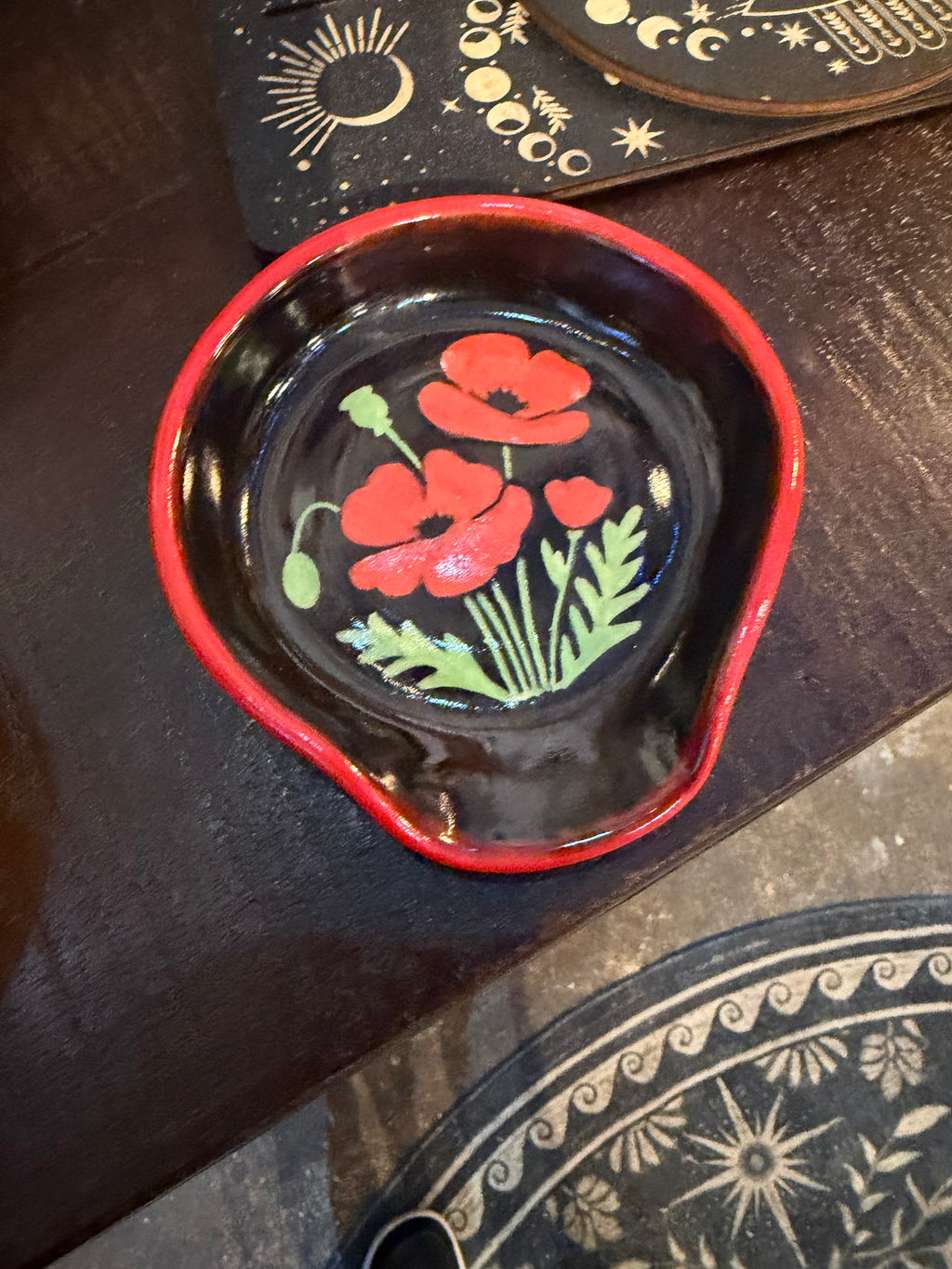 Kelly Gilleran Art black ceramic spoon rest with red poppies